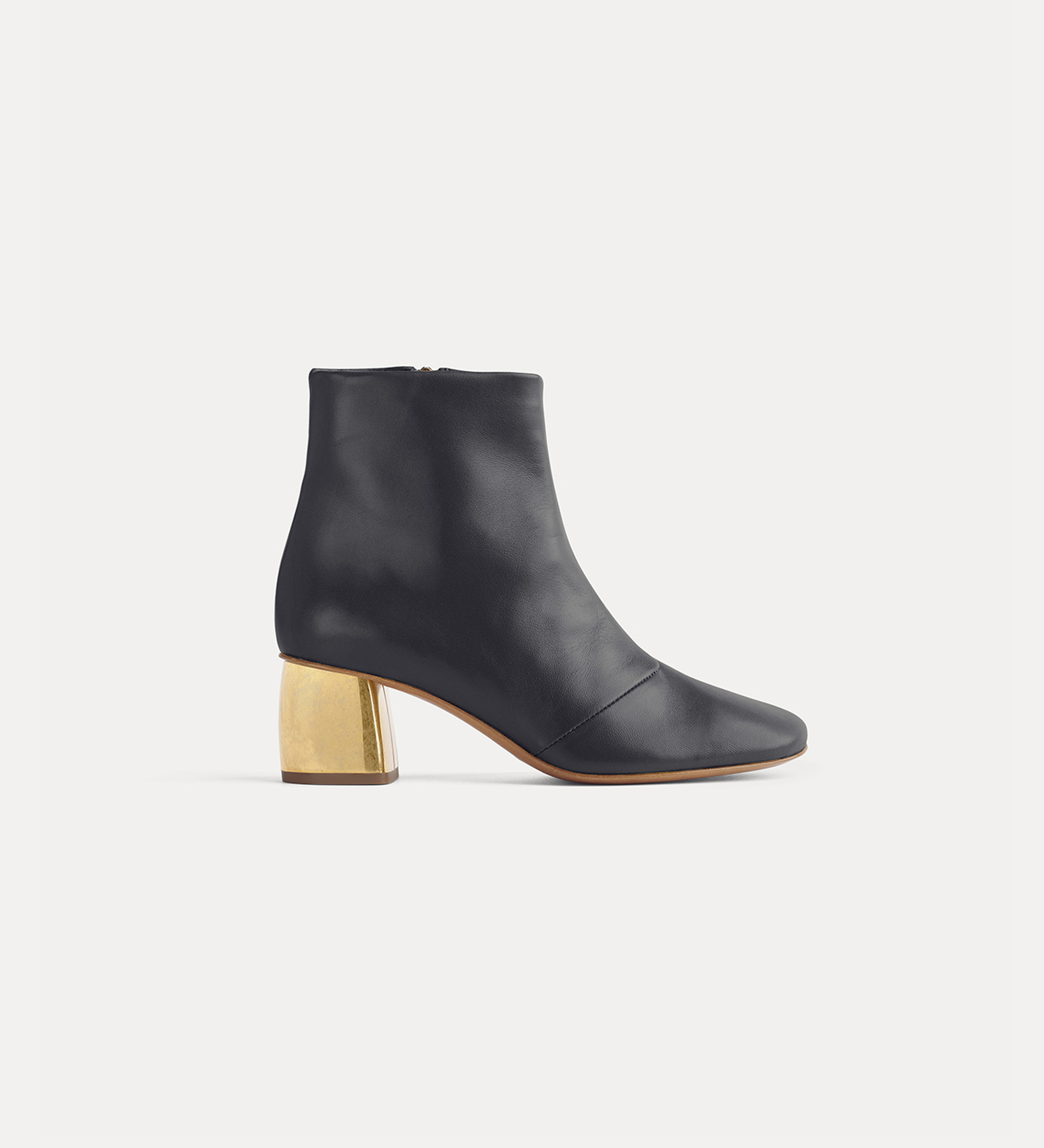 chic nappa ankle boot set on a golden heel | forte_forte