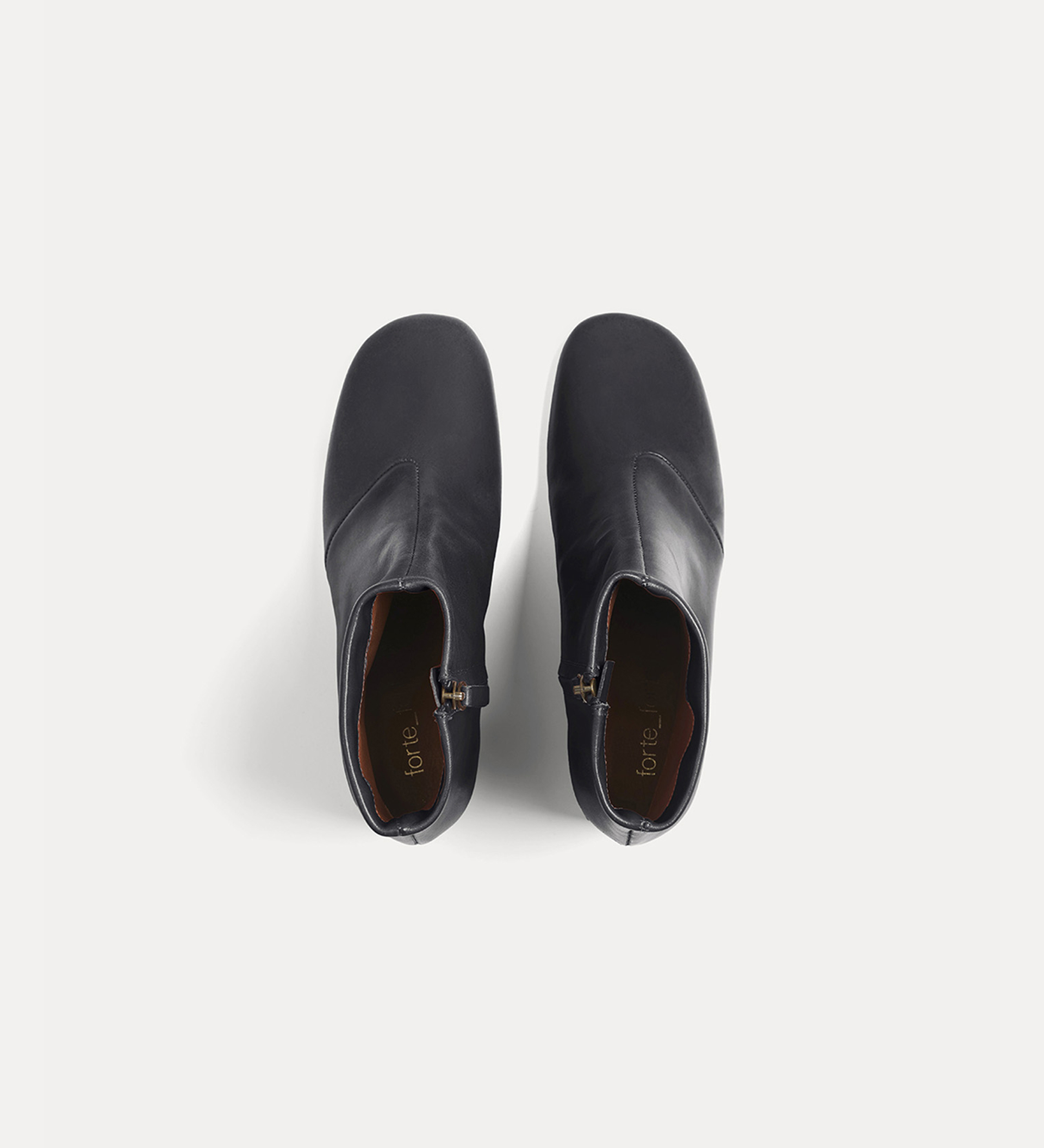 chic nappa ankle boot set on a golden heel | forte_forte