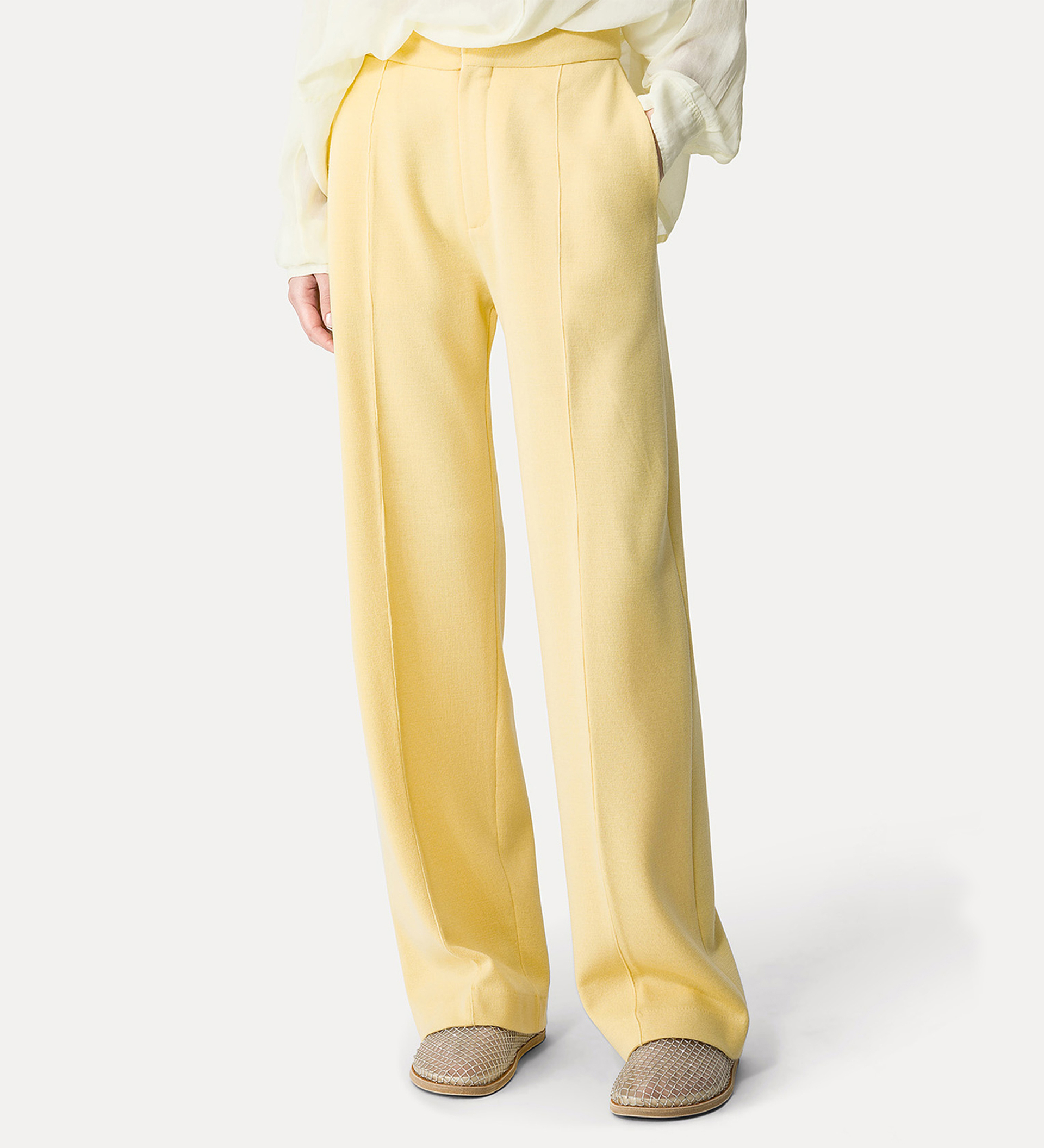 tailored trousers in a yellow full–milan knit | forte_forte