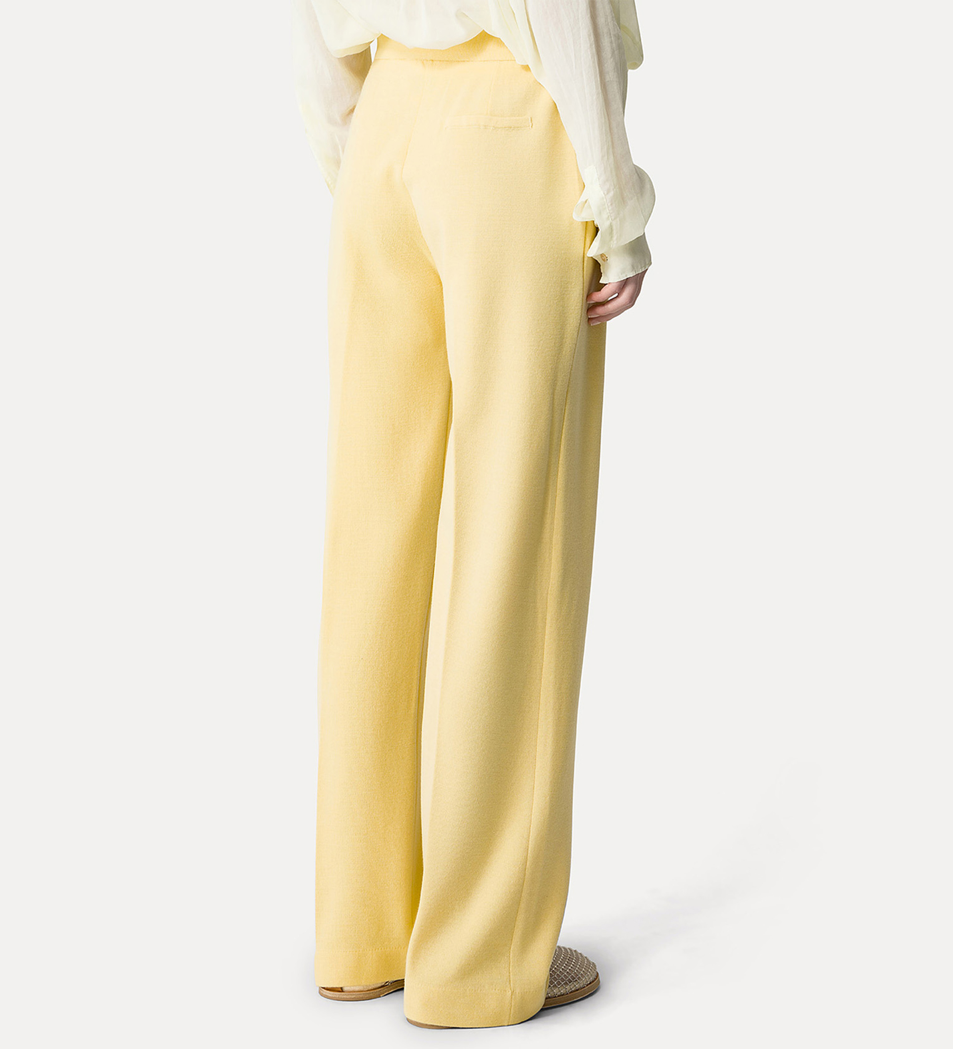 tailored trousers in a yellow full–milan knit | forte_forte
